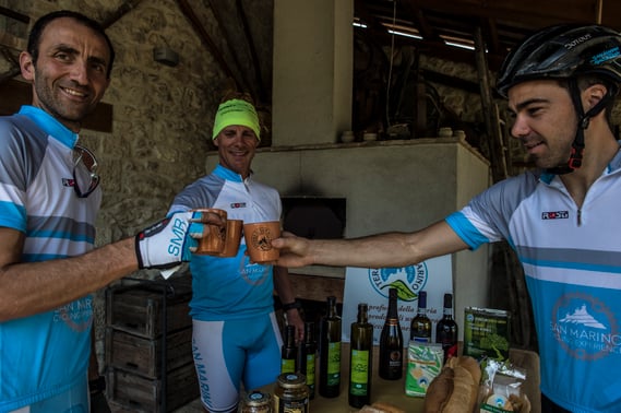 cyclists enjoying a break in san marino